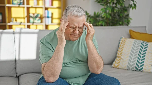 Middle Age Grey Haired Man Suffering Headache Sitting Sofa Home — Stock Photo, Image