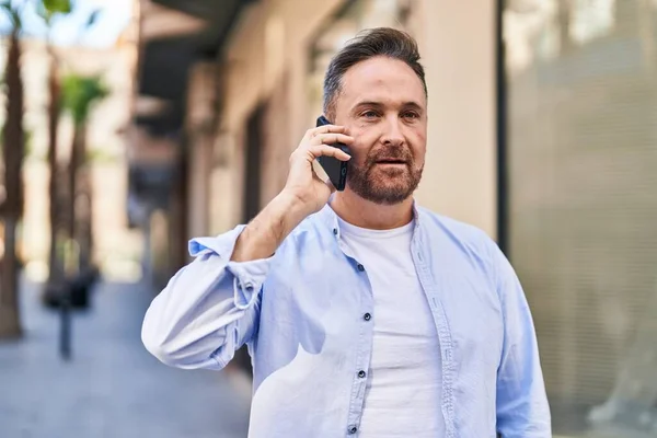 Young Caucasian Man Talking Smartphone Serious Expression Street — Foto Stock