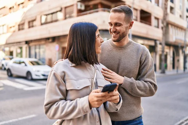 Man Woman Couple Smiling Confident Using Smartphone Street — Foto de Stock