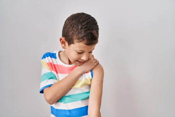 Young Caucasian Kid Getting Vaccine Showing Arm Band Aid Looking — Stock Photo, Image