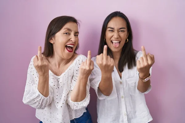 Hispanic Mother Daughter Together Showing Middle Finger Doing Fuck You — Fotografia de Stock