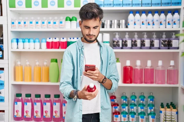Young Hispanic Man Customer Make Photo Smartphone Medicine Bottle Pharmacy — Stockfoto