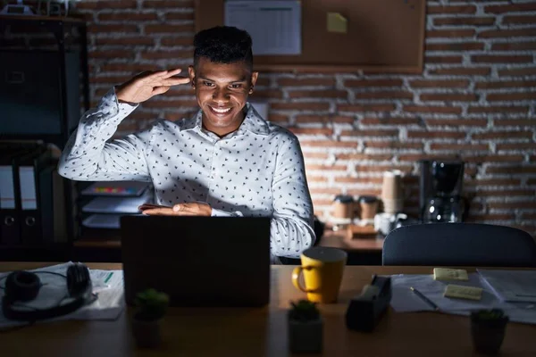 Young Hispanic Man Working Office Night Gesturing Hands Showing Big — Stock Photo, Image