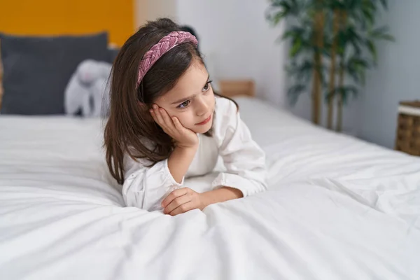 Adorable Hispanic Girl Lying Bed Sad Expression Bedroom — Stock Photo, Image