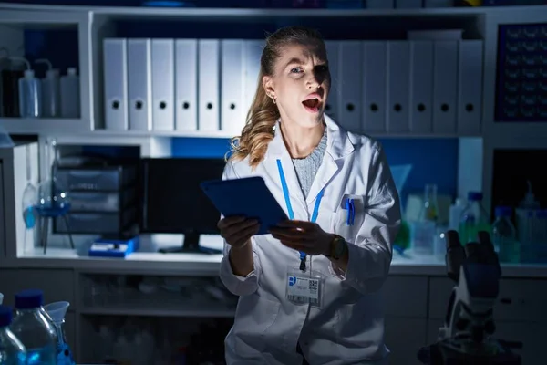 Beautiful Blonde Woman Working Scientist Laboratory Late Night Angry Mad — Stock Photo, Image