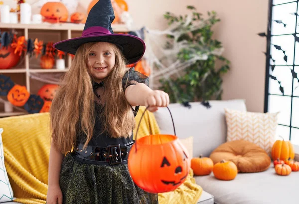 Adorable Blonde Girl Wearing Witch Costume Holding Pumpkin Basket Home — Stock Photo, Image