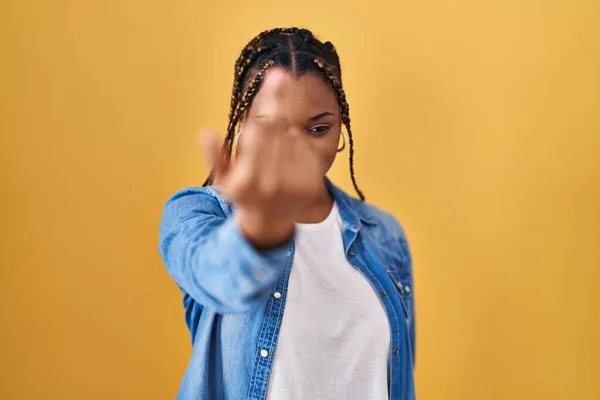 African American Woman Braids Standing Yellow Background Showing Middle Finger — Photo