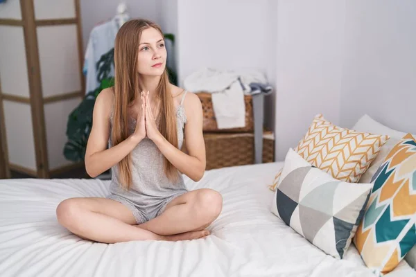 Young Caucasian Woman Doing Yoga Exercise Sitting Bed Bedroom — Foto de Stock