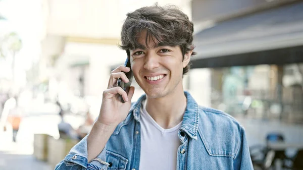 Young Hispanic Man Smiling Confident Talking Smartphone Coffee Shop Terrace — 스톡 사진