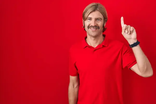 Caucasian Man Mustache Standing Red Background Showing Pointing Finger Number — Stock Photo, Image