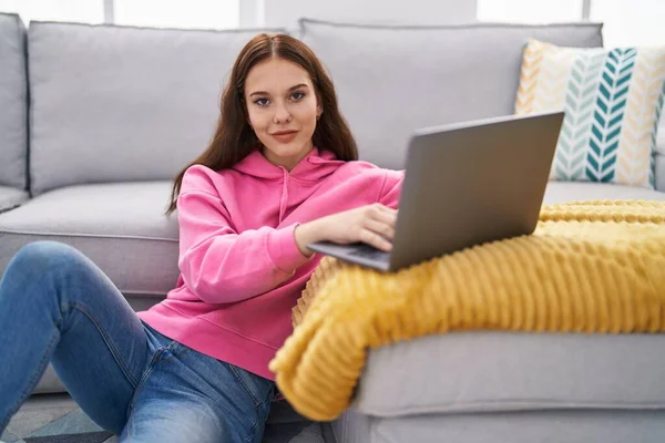 Young Woman Using Laptop Sitting Floor Home — стоковое фото