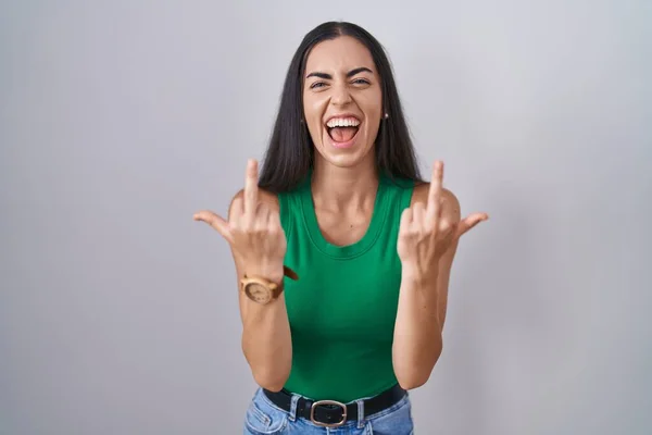 Young Woman Standing Isolated Background Showing Middle Finger Doing Fuck — ストック写真