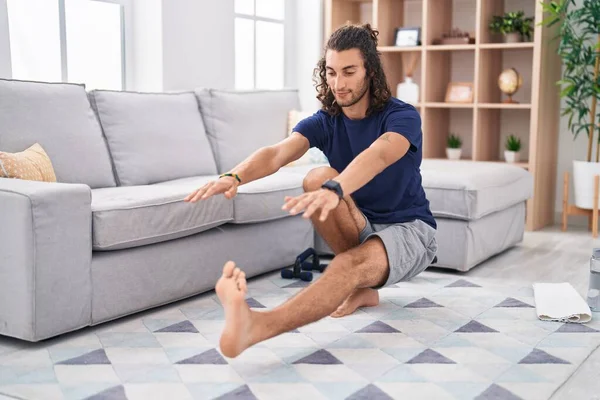Young Hispanic Man Training Yoga Home — Stockfoto