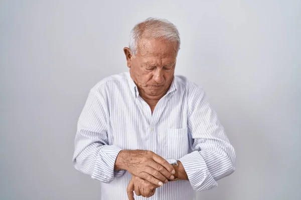 Senior Man Grey Hair Standing Isolated Background Checking Time Wrist — Foto de Stock