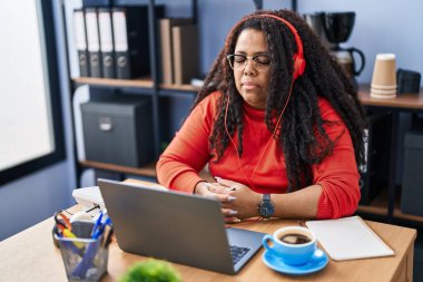 African american woman business worker having video call at office