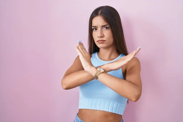 Young Brunette Woman Standing Pink Background Rejection Expression Crossing Arms — Stock Photo, Image