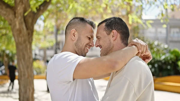 Two Men Couple Smiling Confident Hugging Each Other Park — Zdjęcie stockowe