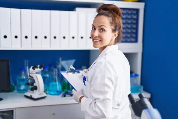 Young Woman Scientist Writing Document Working Laboratory — Foto de Stock