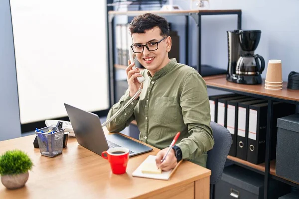 Young Non Binary Man Business Worker Using Laptop Talking Telephone — 图库照片