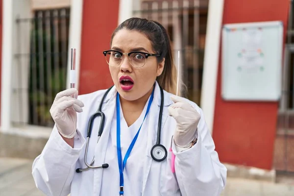 Young Hispanic Doctor Woman Doing Coronavirus Infection Nasal Test Shock — Stock Photo, Image