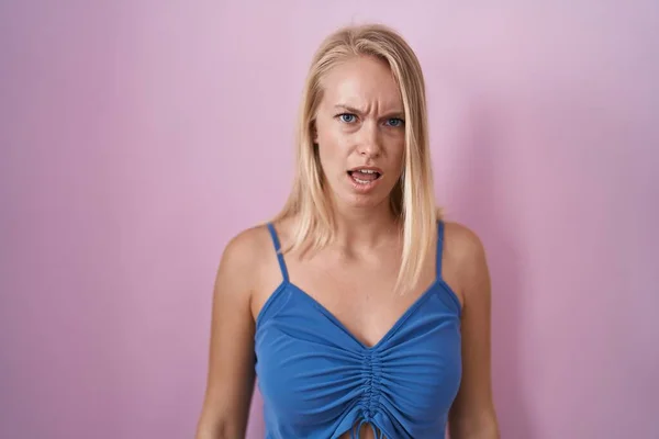 Young Caucasian Woman Standing Pink Background Shock Face Looking Skeptical — Fotografia de Stock