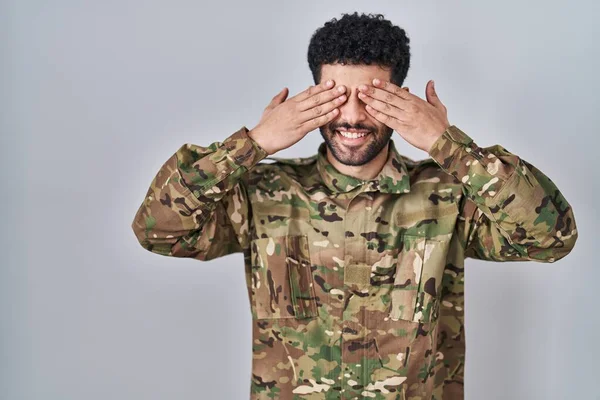 Arab Man Wearing Camouflage Army Uniform Covering Eyes Hands Smiling — Stock Photo, Image