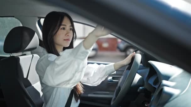 Young Chinese Woman Touching Rearview Sitting Car Street — Vídeos de Stock