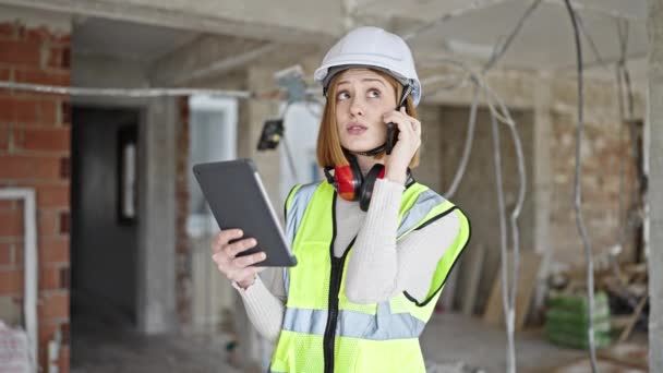 Young Blonde Woman Architect Talking Smartphone Looking Touchpad Construction Site — Stock Video
