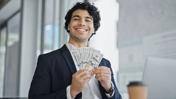 Young Latin Man Business Worker Using Laptop Holding Dollars Office — Foto Stock