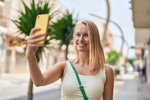 Young Blonde Woman Smiling Confident Making Selfie Smartphone Street — 스톡 사진
