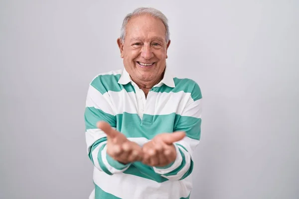Senior Man Grey Hair Standing White Background Smiling Hands Palms — Stock Photo, Image