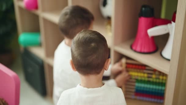 Adorable Boys Standing Relaxed Expression Playing Kindergarten — Stock Video