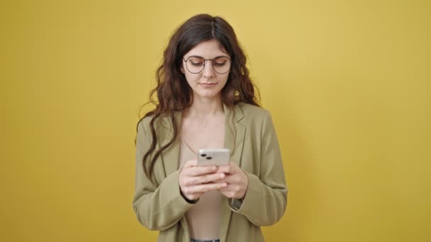 Young Beautiful Hispanic Woman Using Smartphone Smiling Isolated Yellow Background — Stock Video