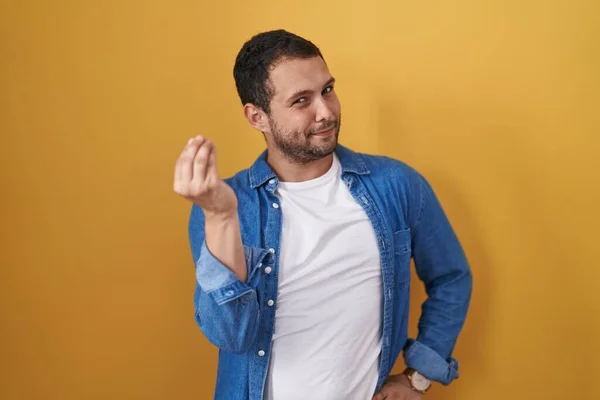 Hispanic Man Standing Yellow Background Doing Italian Gesture Hand Fingers — Fotografia de Stock