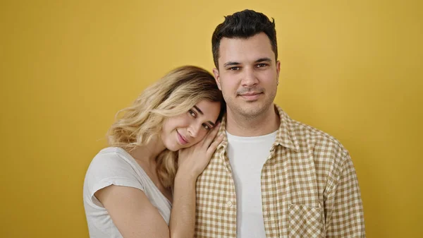 Man Woman Couple Smiling Confident Standing Together Isolated Yellow Background — ストック写真
