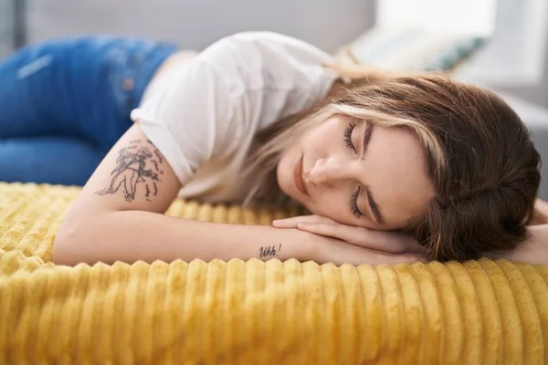 Young Woman Lying Sofa Sleeping Home — ストック写真