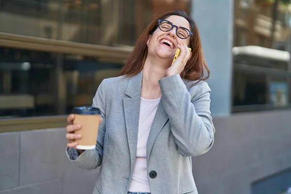 Young Woman Business Worker Talking Smartphone Drinking Coffee Street — Zdjęcie stockowe