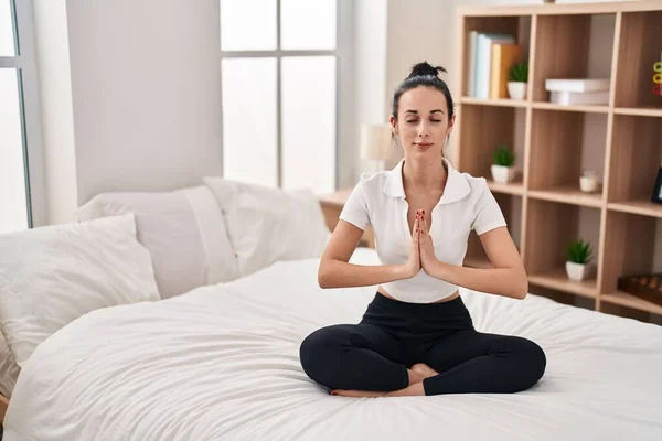 Young Caucasian Woman Doing Yoga Exercise Sitting Bed Bedroom — Fotografia de Stock
