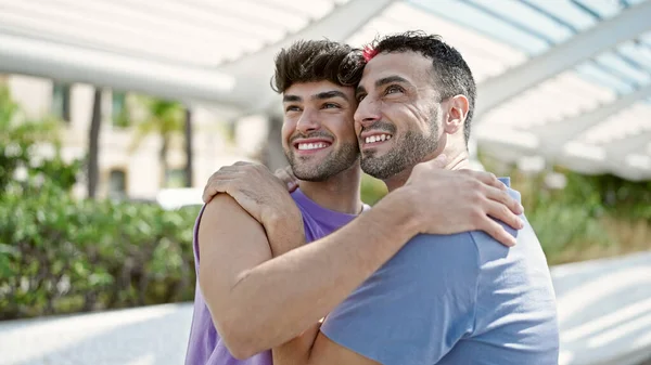 Two Men Couple Smiling Confident Hugging Each Other Park — Stock fotografie
