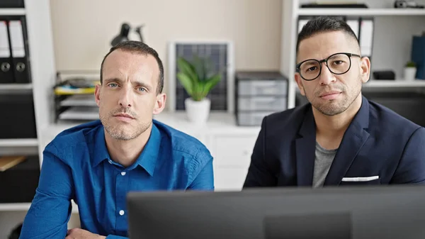 stock image Two men business workers working with relaxed expression at office