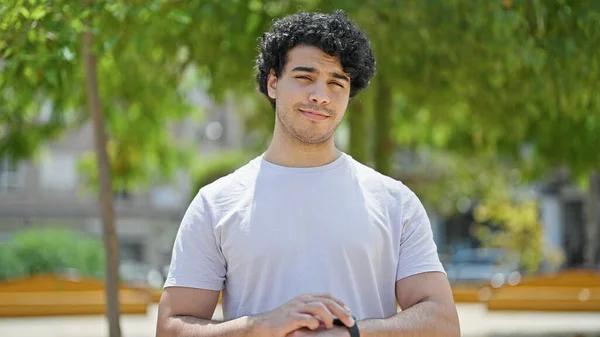 Young Latin Man Smiling Confident Touching Watch Park — Stock Photo, Image