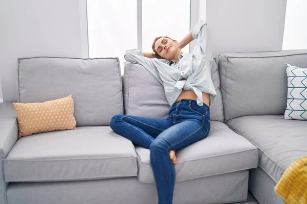 Young Woman Relaxed Hands Head Sitting Sofa Home — Photo