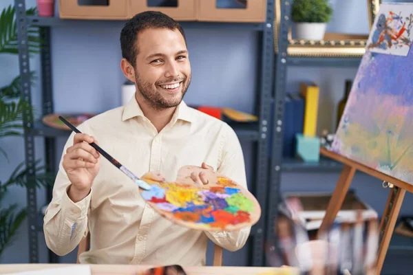 Young Man Artist Smiling Confident Holding Paintbrush Palette Art Studio — 图库照片