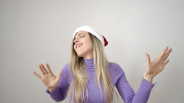 Молодая Блондинка Рождественской Шляпе Танцует Изолированном Белом Фоне — стоковое фото
