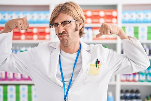 Caucasian Man Mustache Working Pharmacy Drugstore Showing Arms Muscles Smiling — Stock Photo, Image