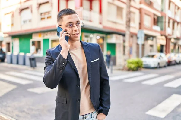 Young Hispanic Man Executive Smiling Confident Talking Smartphone Street —  Fotos de Stock