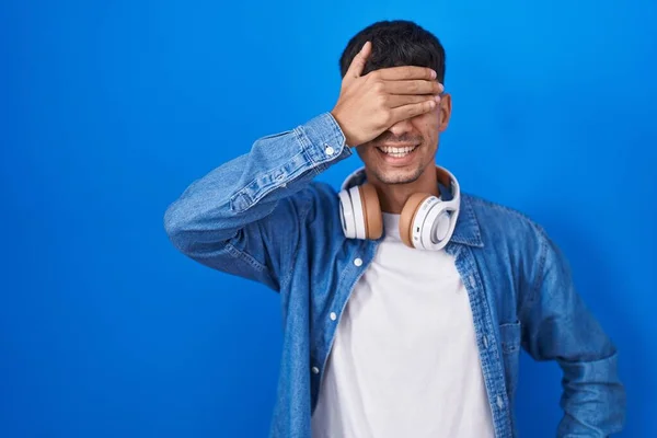 Young Hispanic Man Standing Blue Background Smiling Laughing Hand Face — Stockfoto