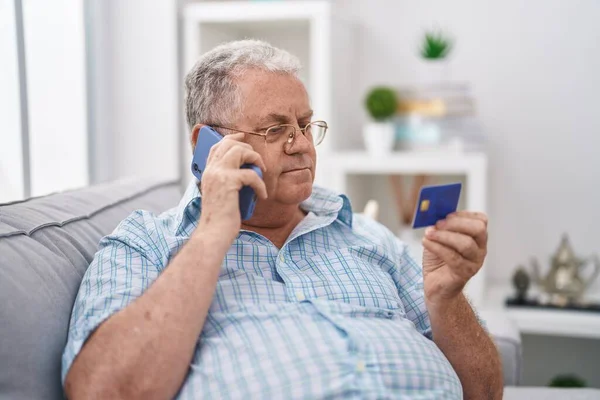Middle Age Grey Haired Man Talking Smartphone Holding Credit Card — Stock fotografie