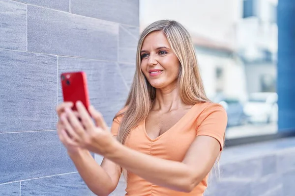 Young Blonde Woman Smiling Confident Making Selfie Smartphone Street — Stok fotoğraf