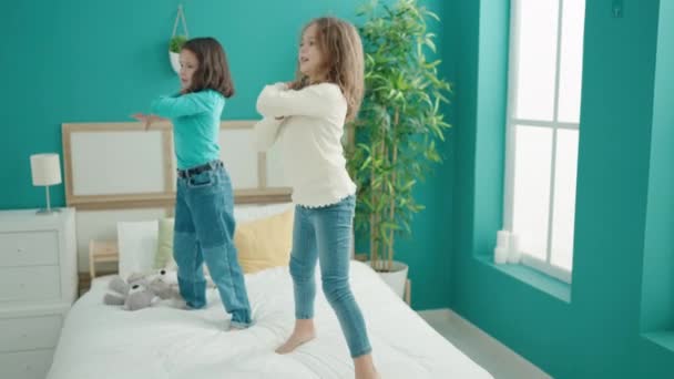 Adorable Girls Smiling Confident Dancing Bed Bedroom — Stock Video